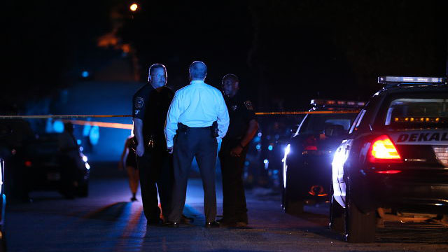 DeKalb County officials said the officer was in surgery following the shooting.