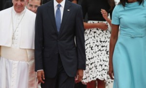 Pope Francis escorted by President Obama, FIrst Lady Michelle Obama and daughters upon arrival to the U.S. from Cuba.